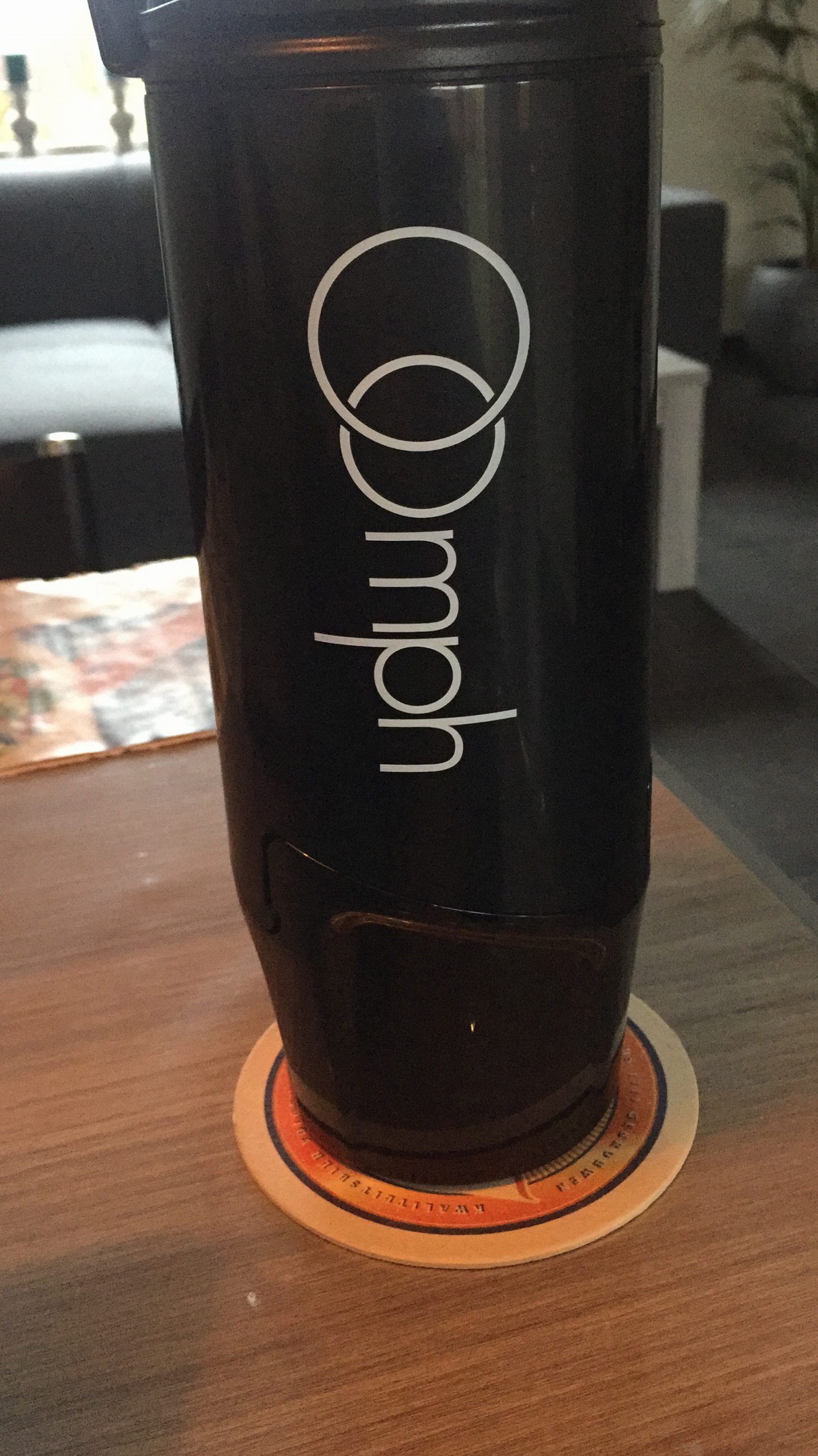 Oomph on wooden table
